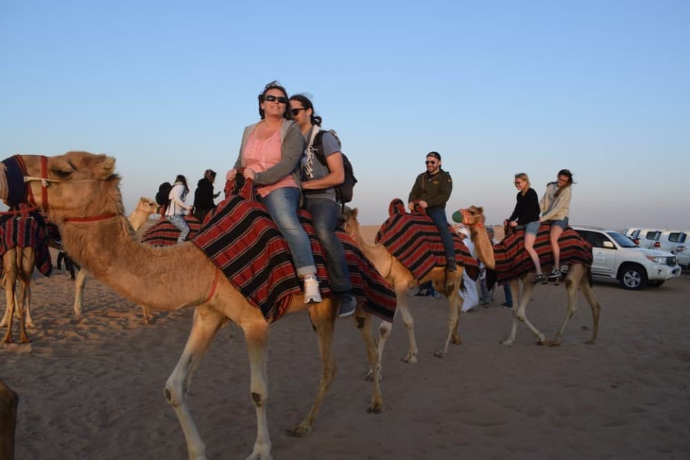 Dubai: Evening Tour with Quad Biking Camel Ride and BBQ | ®ExcursionMania