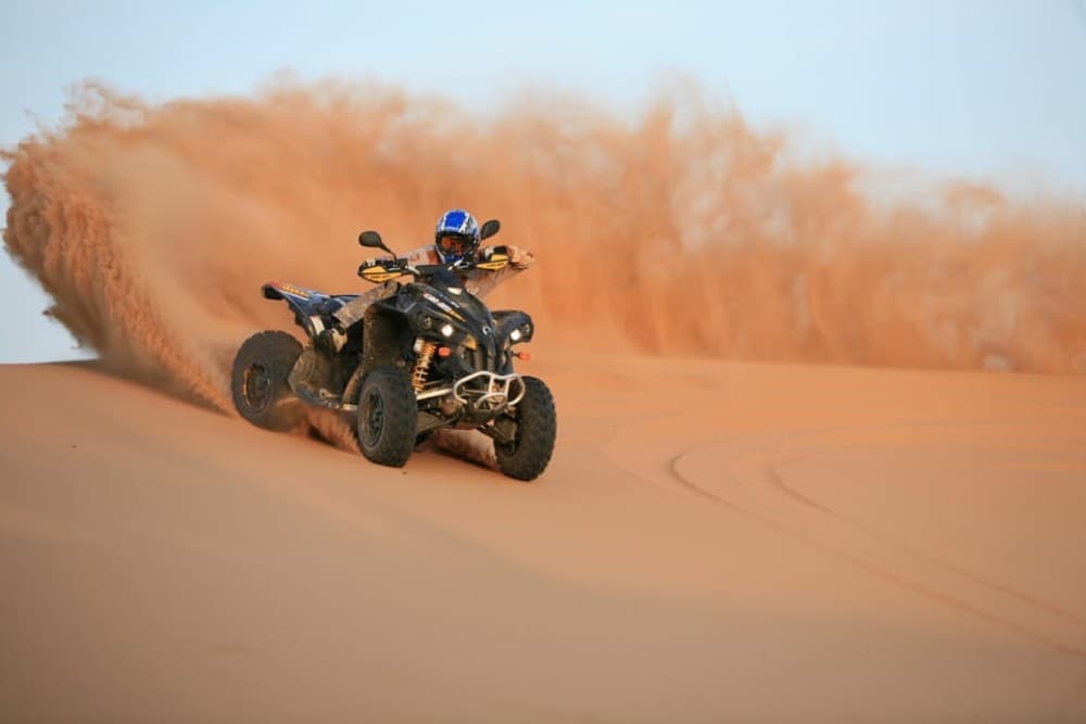 Dubai: Evening Tour with Quad Biking Camel Ride and BBQ | ®ExcursionMania