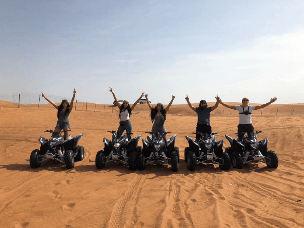Dubai: Evening Tour with Quad Biking Camel Ride and BBQ | ®ExcursionMania