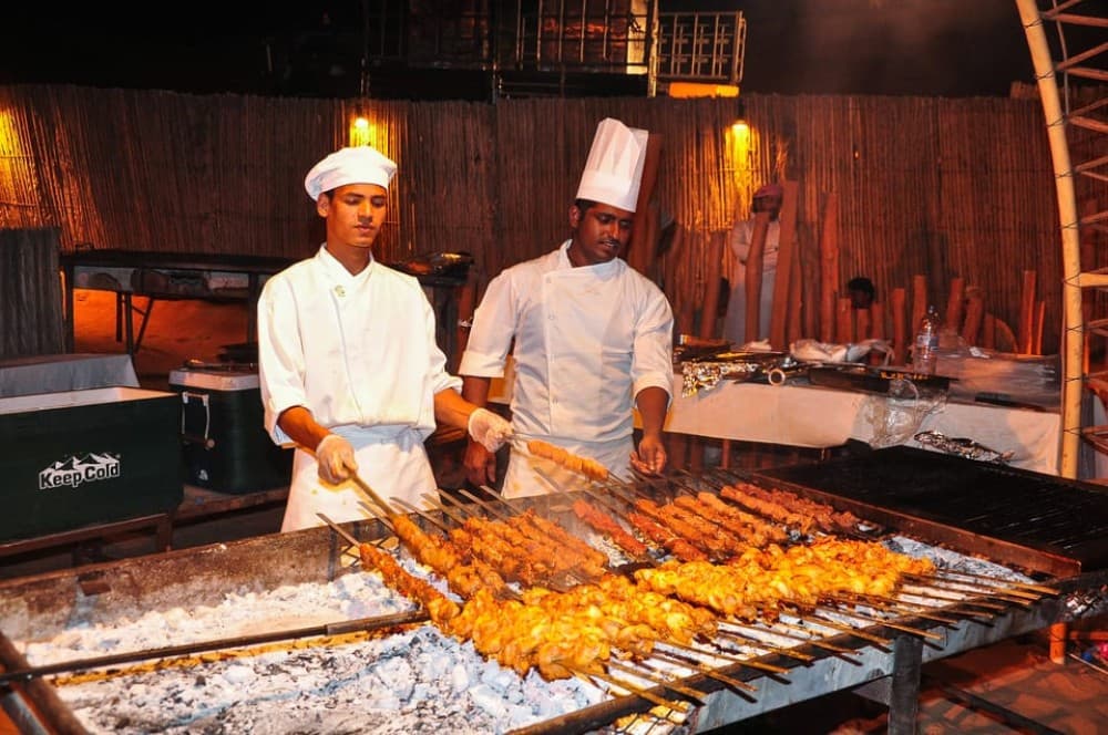 Dubai: Safari Quad Bike Camel Ride and Buffet Dinner | ®ExcursionMania