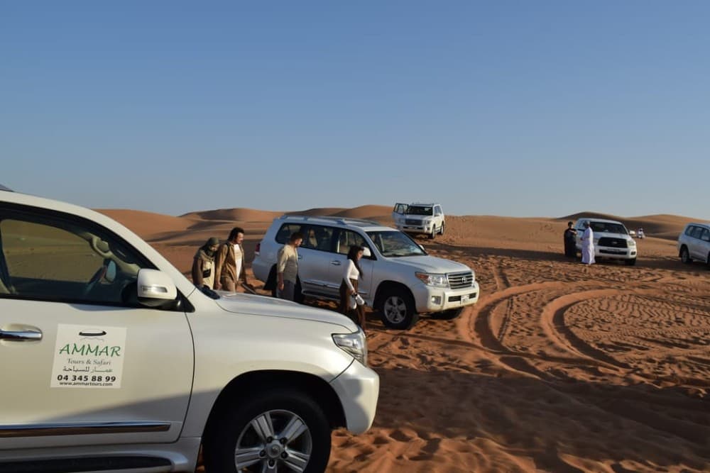 Dubai: Desert Safari Quad Bike Camel Ride and Sandboarding | ®ExcursionMania