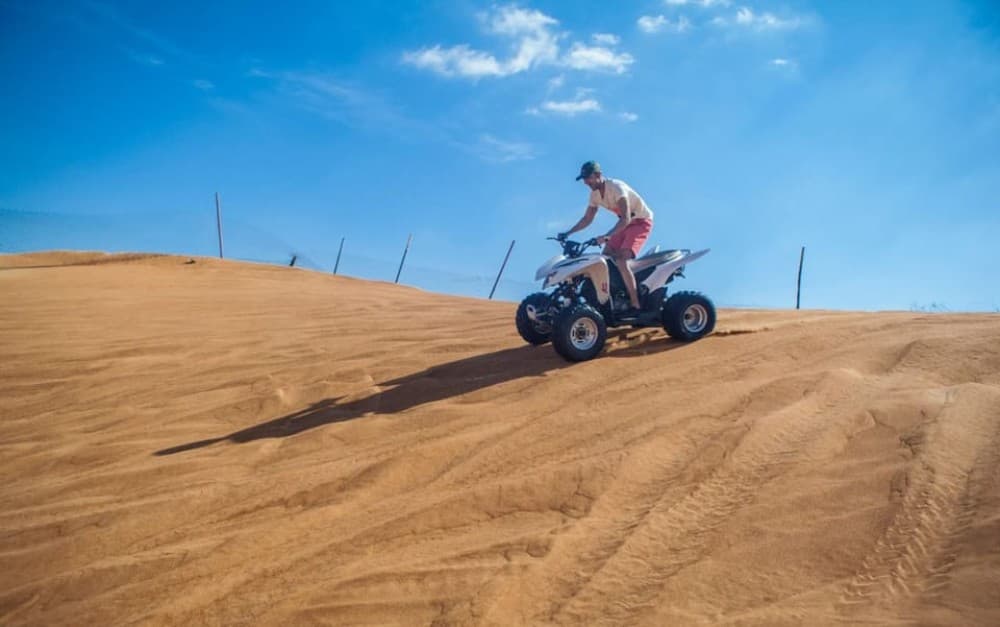 Dubai: Desert Safari Quad Bike Camel Ride and Sandboarding | ®ExcursionMania