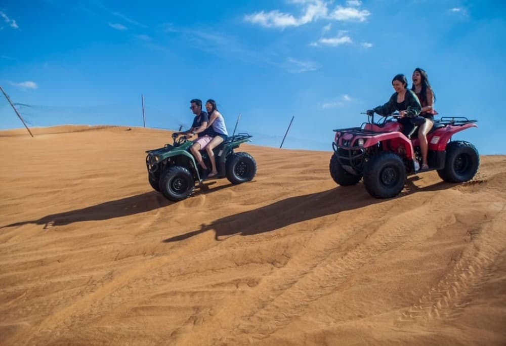 Dubai: Desert Safari Quad Bike Camel Ride and Sandboarding | ®ExcursionMania