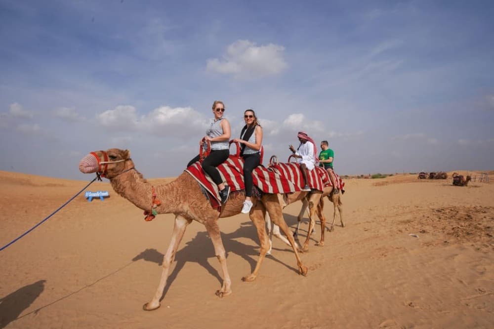 Dubai: Red Dunes Quad Bike, Dune Buggy, Camel & Refreshments | ®ExcursionMania