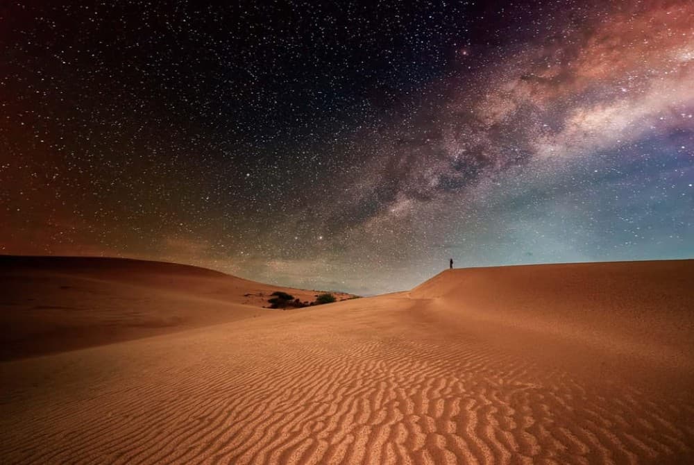 Doha: Nighttime Desert Safari with Dune Bashing & Camel Ride | ®ExcursionMania