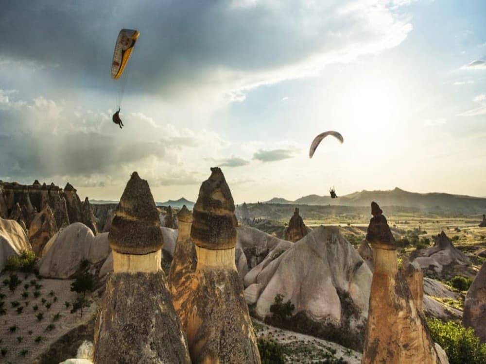 Cappadocia: Tandem Paragliding Adventure w/Hotel Pickup | ®ExcursionMania
