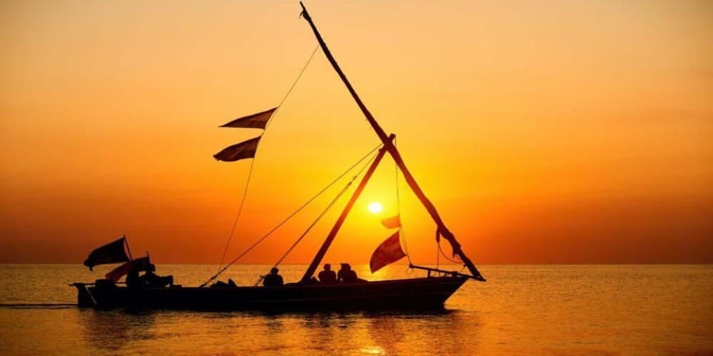 From Nungwi: Guided Sunset Dhow Cruise | ®ExcursionMania
