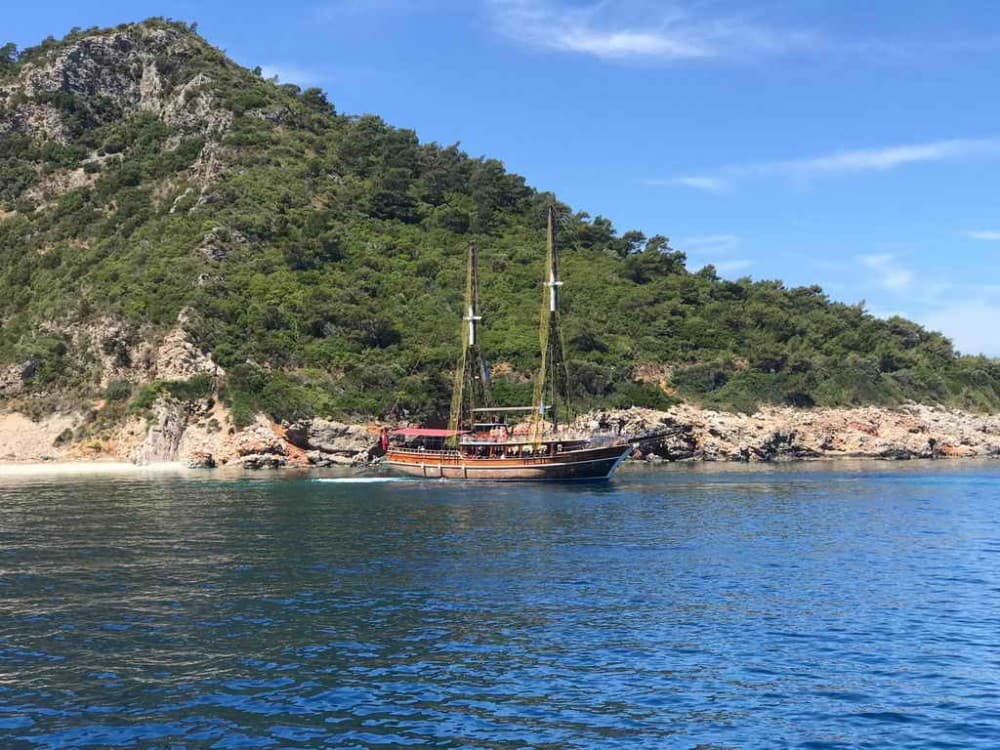 From Kusadasi: Boat Tour & Lunch w/ Transfers | ®ExcursionMania
