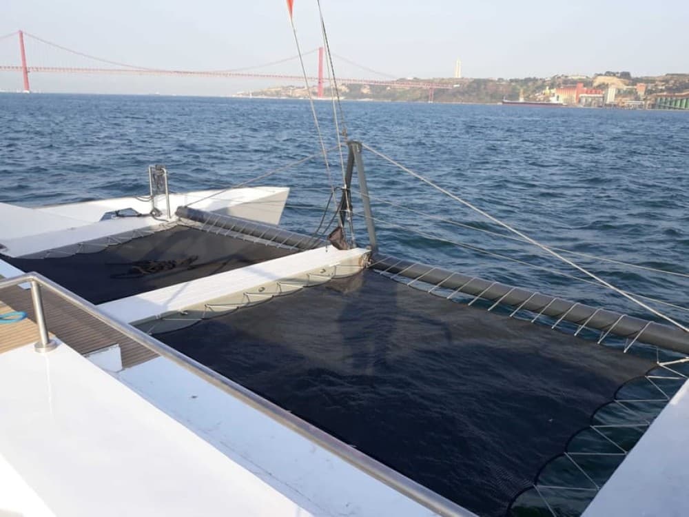Lisbon: Private Catamaran Charter for up to 18-People | ®ExcursionMania