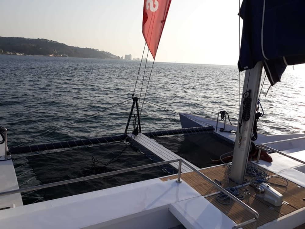 Lisbon: Private Catamaran Charter for up to 18-People | ®ExcursionMania