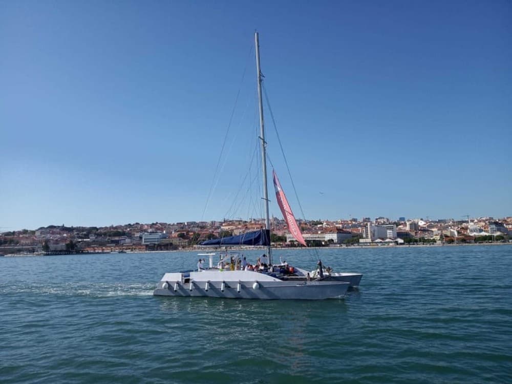 Lisbon: Private Catamaran Charter for up to 18-People | ®ExcursionMania