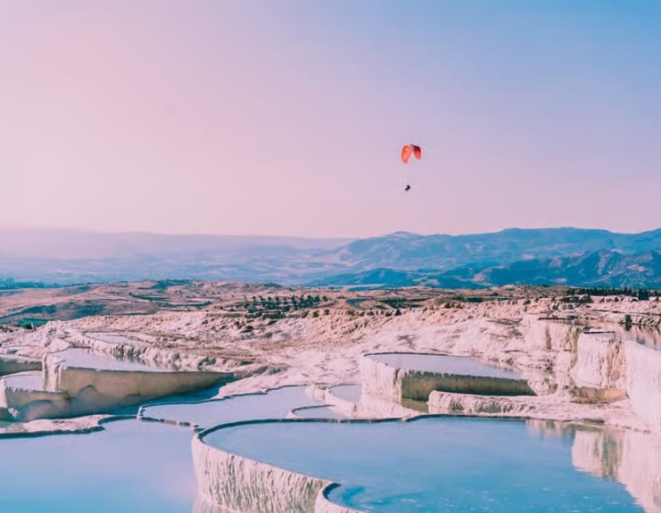 Pamukkale: Tandem Paragliding with Ancient Hierapolis Views | ®ExcursionMania