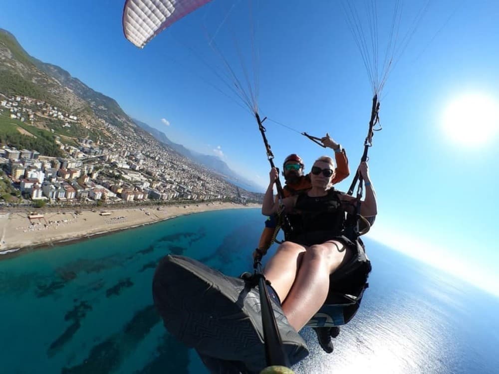 From Side: Paragliding to Alanya with Cable Car Ride | ®ExcursionMania