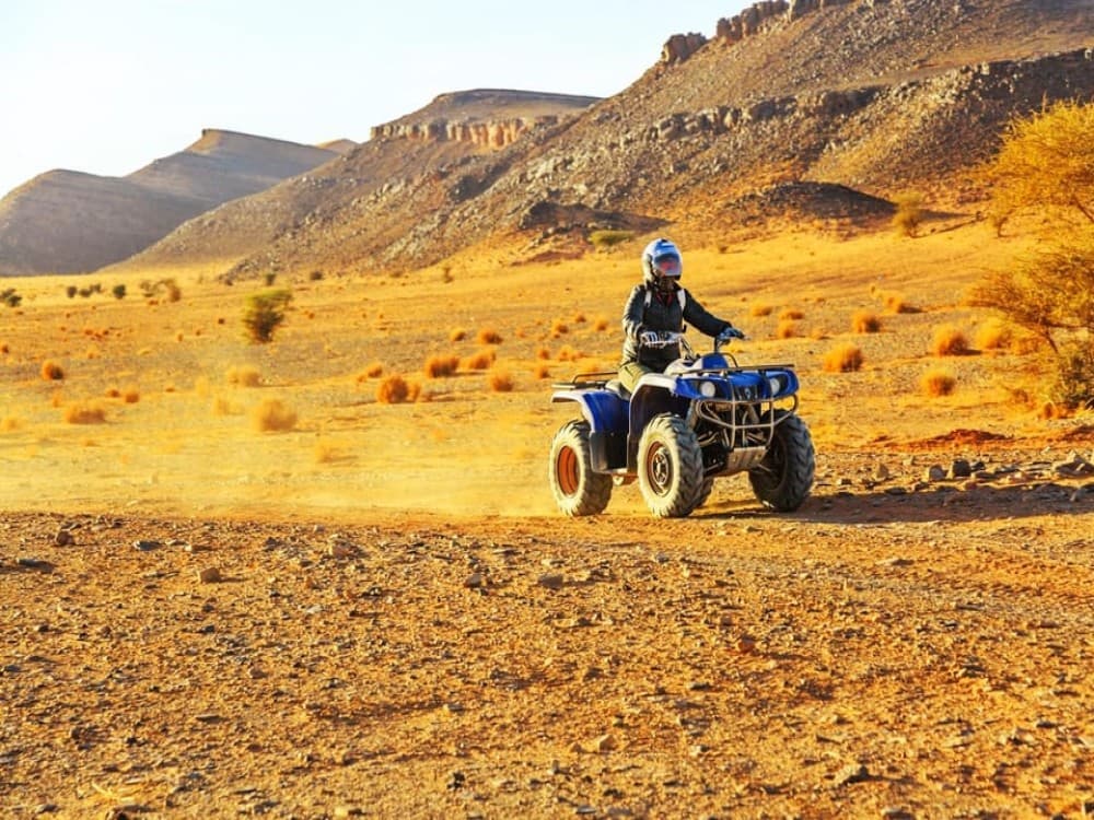 From Marrakech: Agafay Desert Quad Bike and Camel Ride Tour Adventure | ®ExcursionMania