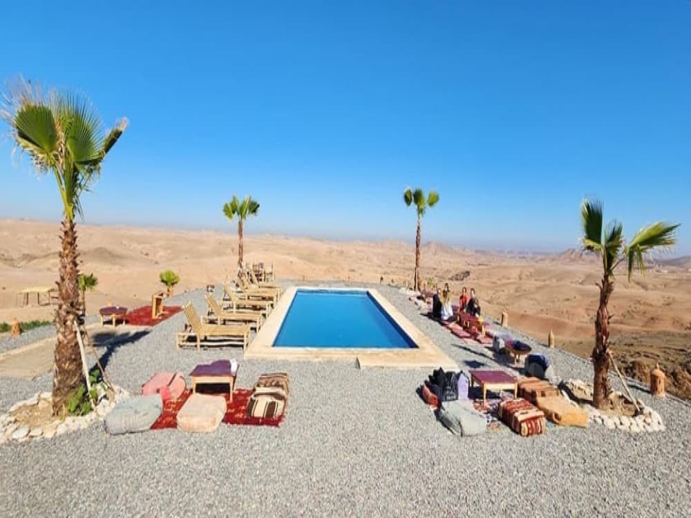 Agafay Desert: Sunset Camel Ride & Moroccan Dinner with Pool | ®ExcursionMania