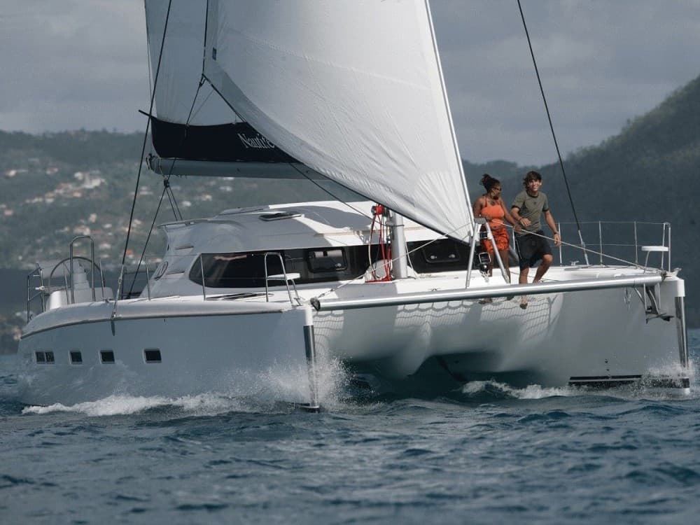 Mykonos Bliss: Catamaran Cruise to Rhenia Island with Meal & Drinks | ®ExcursionMania
