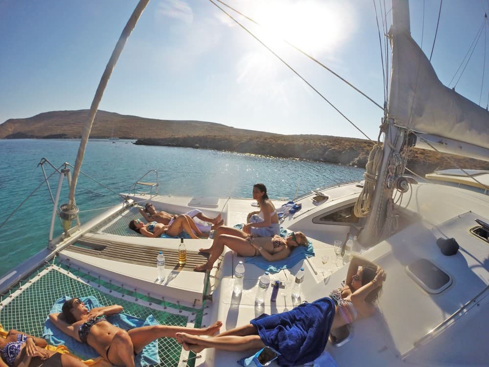 Mykonos Bliss: Catamaran Cruise to Rhenia Island with Meal & Drinks | ®ExcursionMania