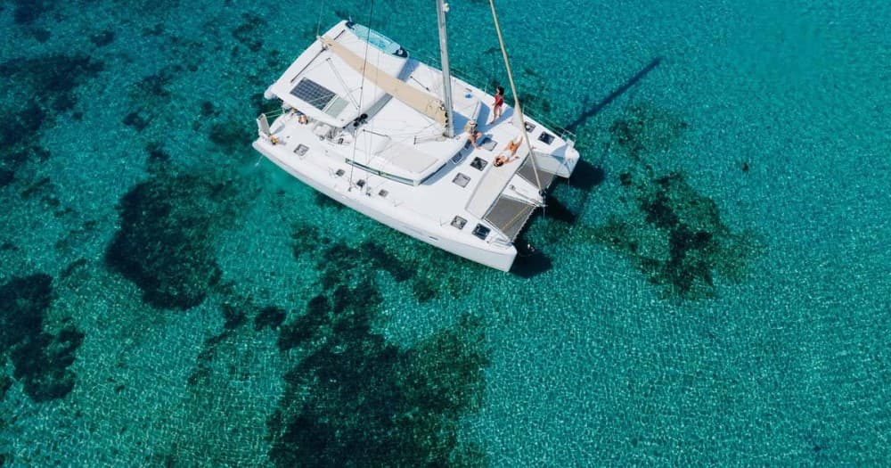 Crystal Waters & Greek Flavors: A Mykonos Sailing Adventure | ®ExcursionMania