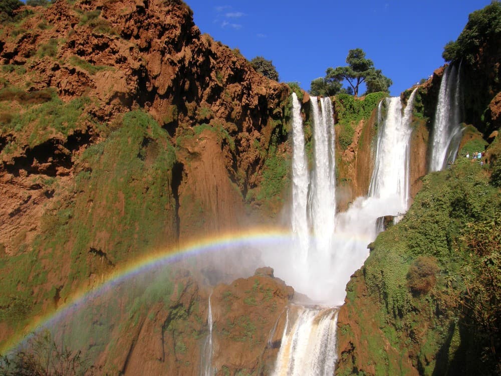 From Marrakech: Ouzoud Waterfalls Guided Hike and Boat Trip | ®ExcursionMania