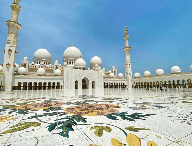 From Abu Dhabi: Grand Mosque Royal Palace and Etihad Tower | ®ExcursionMania