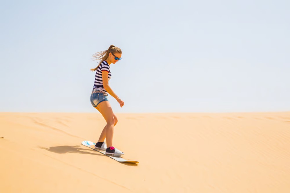 Doha: Desert Safari w/ Quad Bike Sandboarding  Camel Ride | ®ExcursionMania