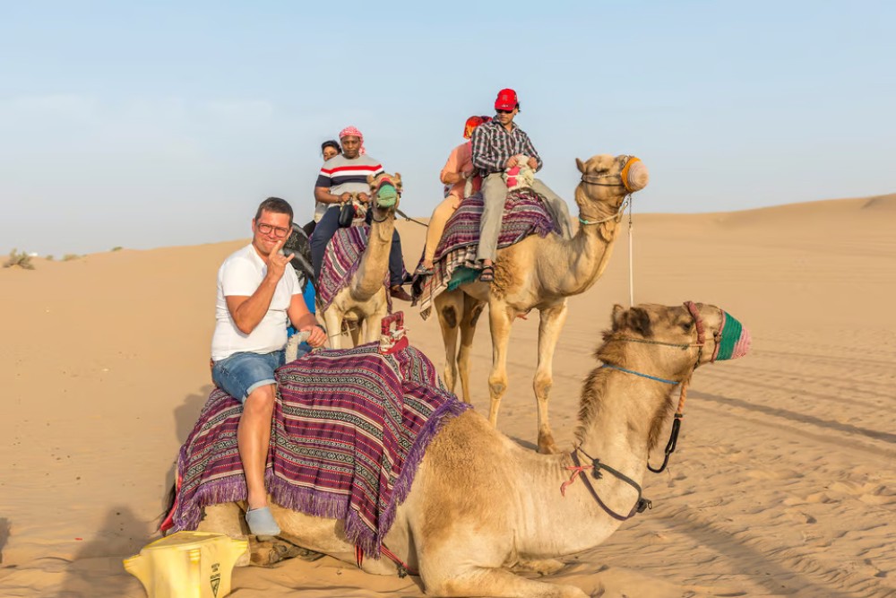 Doha: Desert Safari w/ Quad Bike Sandboarding  Camel Ride | ®ExcursionMania