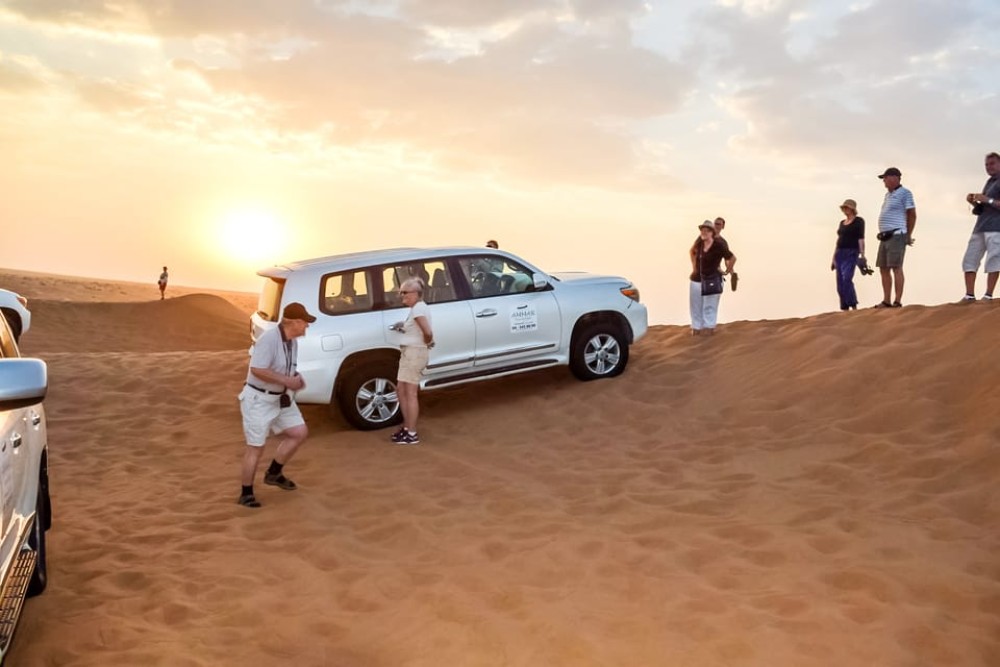 Dubai: Red Dune Safari Camel Ride Sandboarding and Dinner | ®ExcursionMania