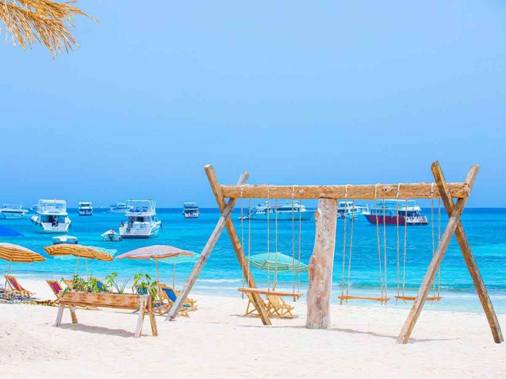 Hurghada: Eden Island Sirene Boat Snorkeling Trip | ®ExcursionMania