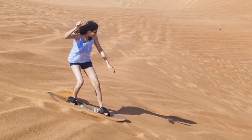 Dubai: Desert Safari Quad Bike Camel Ride and Sandboarding | ®ExcursionMania
