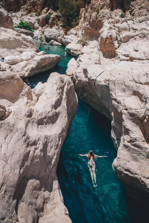 From Muscat: Wadi Shab & Bimah Sinkhole Adventure | ®ExcursionMania