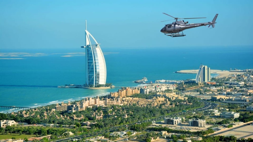 Dubai: Helicopter Ride, Old Town Walking Tour, Abra & Snacks | ®ExcursionMania