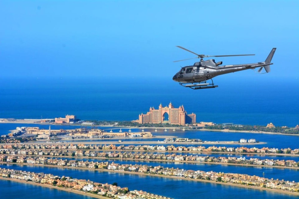 Dubai: Helicopter Ride, Old Town Walking Tour, Abra & Snacks | ®ExcursionMania