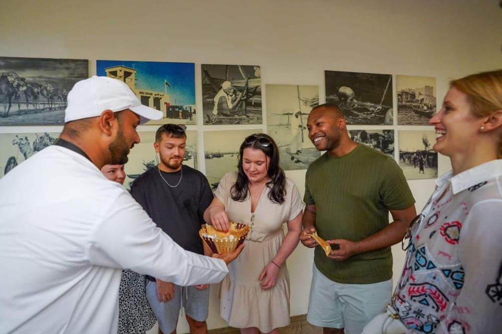 Dubai: Helicopter Ride, Old Town Walking Tour, Abra & Snacks | ®ExcursionMania