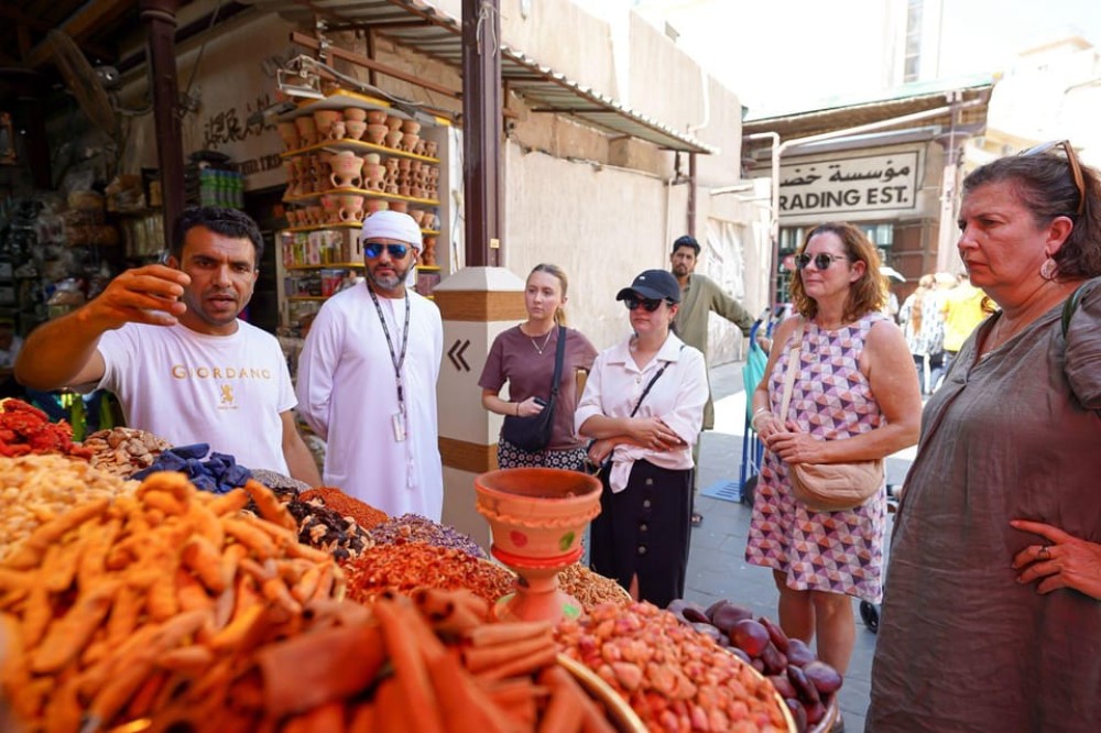 Dubai: Helicopter Ride, Old Town Walking Tour, Abra & Snacks | ®ExcursionMania