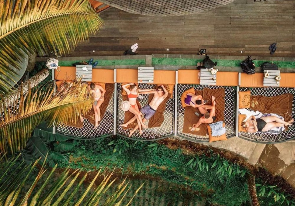 Ubud: Jungle Club, Waterfall, Market, and Tanah Lot Tour | ®ExcursionMania