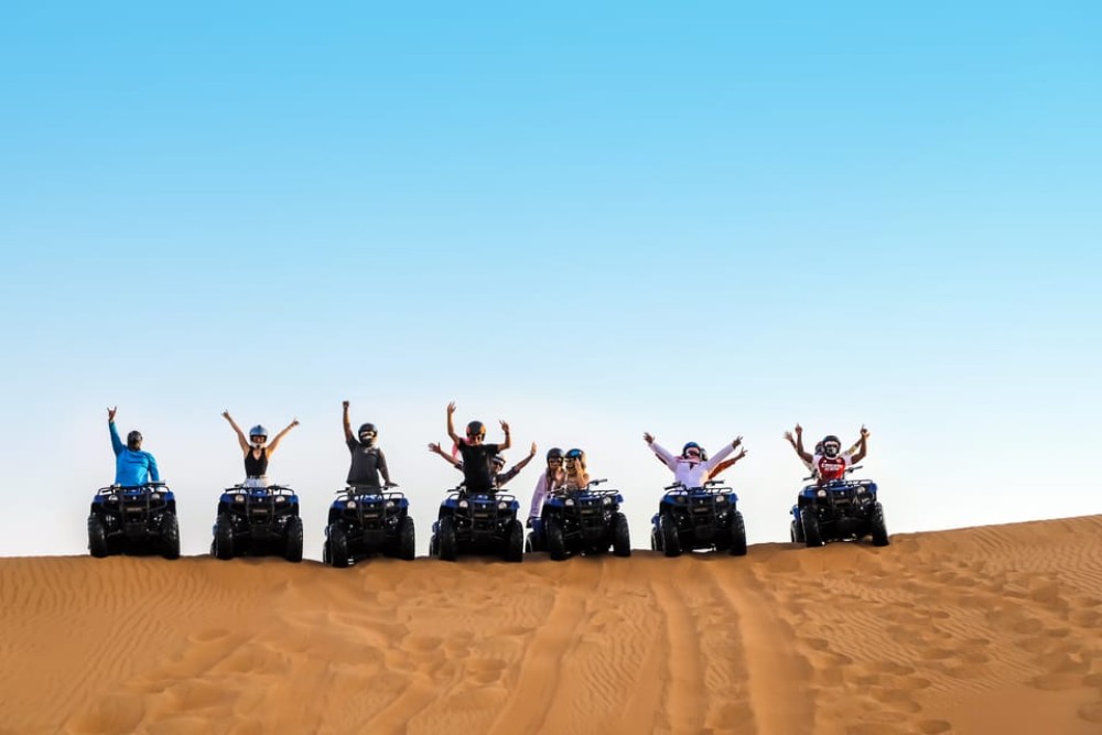 Dubai: Red Dunes Quad Bike, Dune Buggy, Camel & Refreshments | ®ExcursionMania