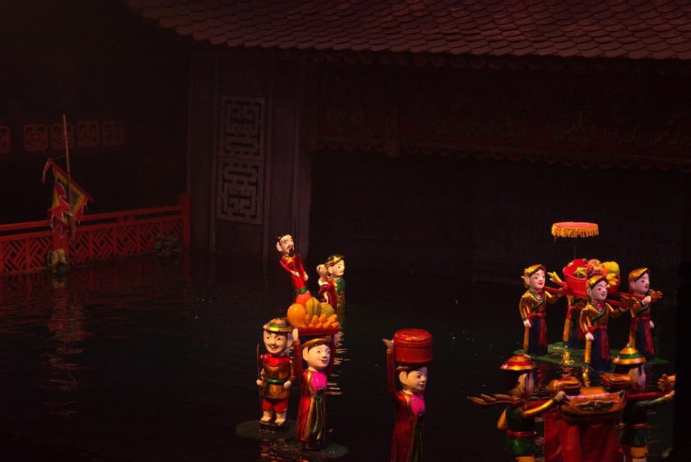 Private Evening Cyclo Tour with Water Puppet Show | ®ExcursionMania