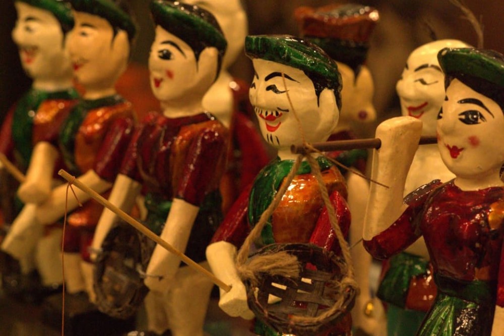 Private Evening Cyclo Tour with Water Puppet Show | ®ExcursionMania