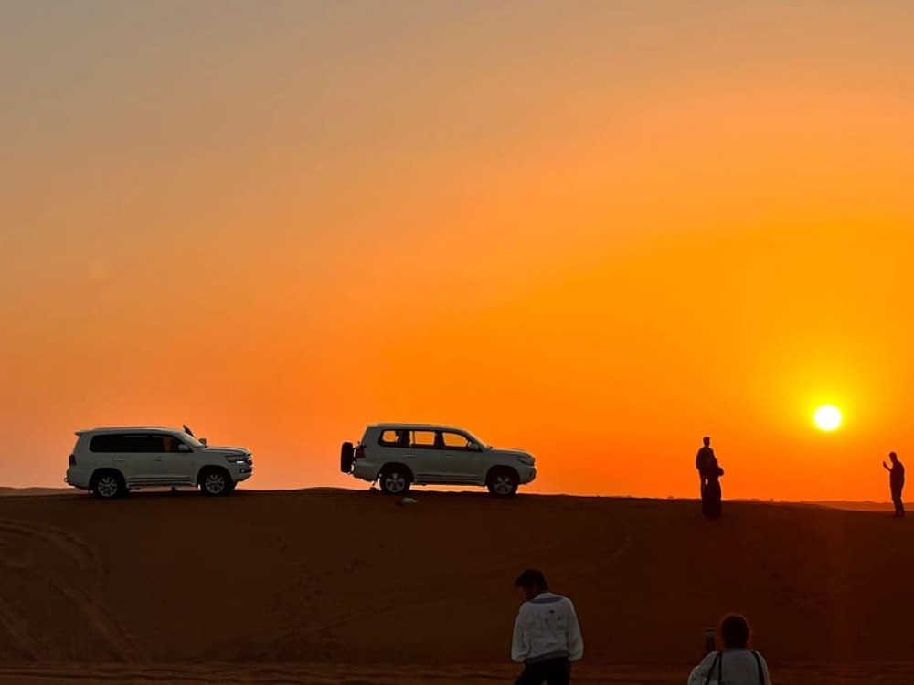 Doha: Nighttime Desert Safari with Dune Bashing & Camel Ride | ®ExcursionMania