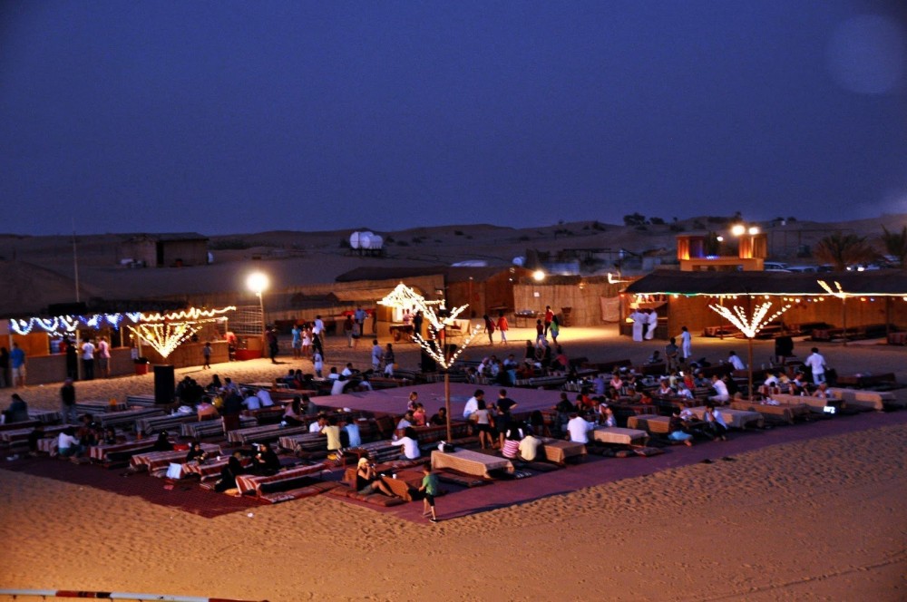 Doha: Nighttime Desert Safari with Dune Bashing & Camel Ride | ®ExcursionMania