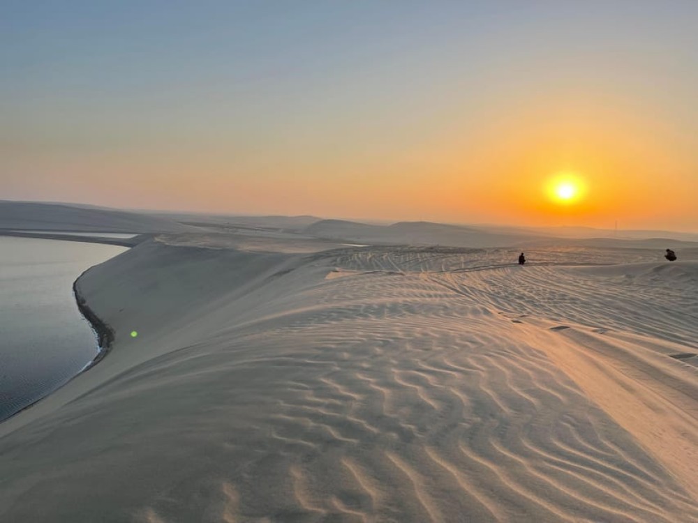 Doha: Nighttime Desert Safari with Dune Bashing & Camel Ride | ®ExcursionMania