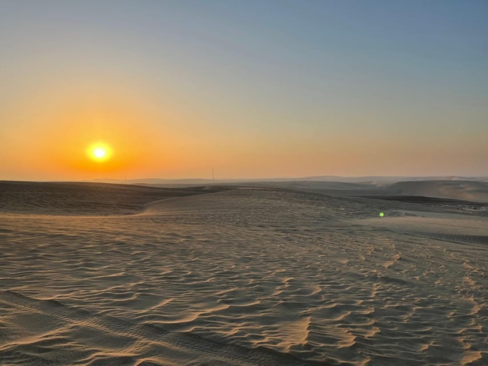 Doha: Nighttime Desert Safari with Dune Bashing & Camel Ride | ®ExcursionMania