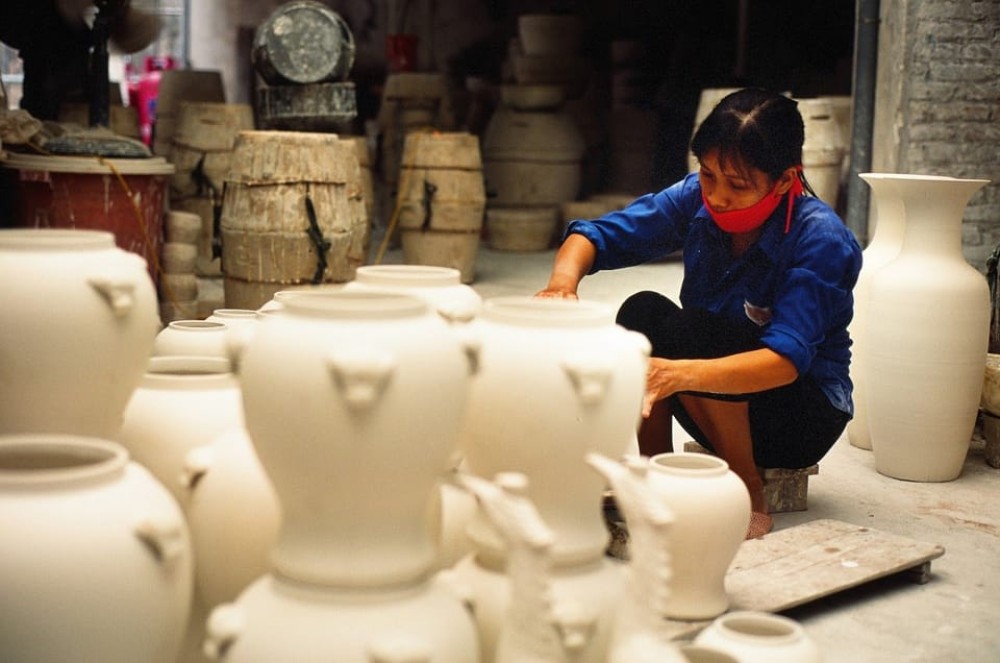 Bat Trang Pottery ancient village by Motorbike | ®ExcursionMania