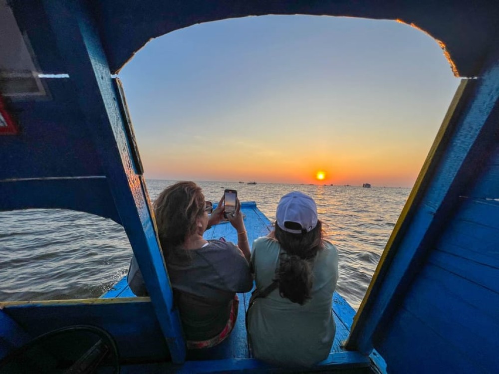 Siem Reap: Tonle Sap Sunset Boat Cruise with Transfers | ®ExcursionMania