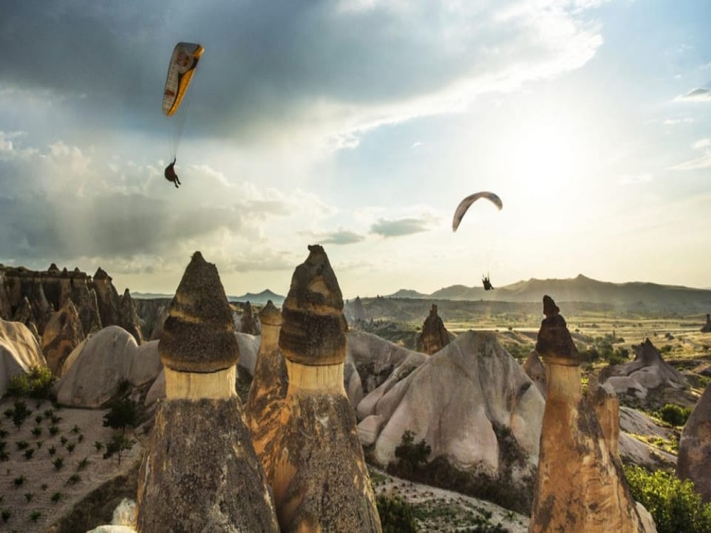 Cappadocia: Tandem Paragliding Adventure w/Hotel Pickup | ®ExcursionMania