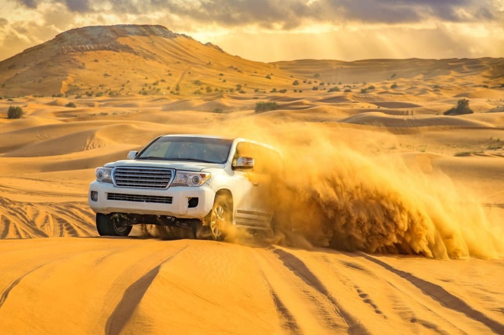 Doha: Quadbike/Desert Safari, Camel Ride, Sandboarding | ®ExcursionMania