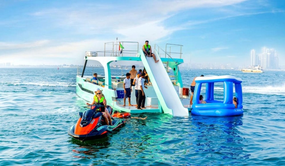 Slide, Cruise & Party on JUMP Private Yacht with BBQ&Drinks | ®ExcursionMania