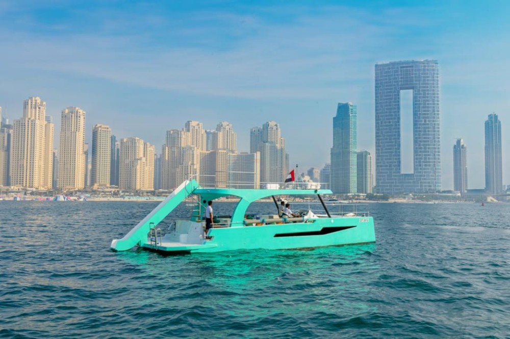 Slide, Cruise & Party on JUMP Private Yacht with BBQ&Drinks | ®ExcursionMania