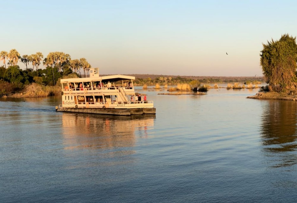 Victoria Falls Guided Tour  Sunset Boat Cruise | ®ExcursionMania