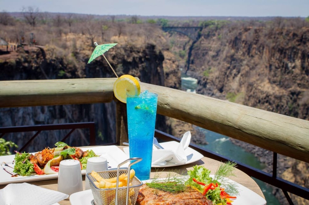 Victoria Falls: Cultural Tour with High Tea | ®ExcursionMania